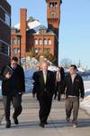 Senator Johnson walks with Discovery Center Director Dr. Randall Hulke (left) and student Philip Rizzo (right)
