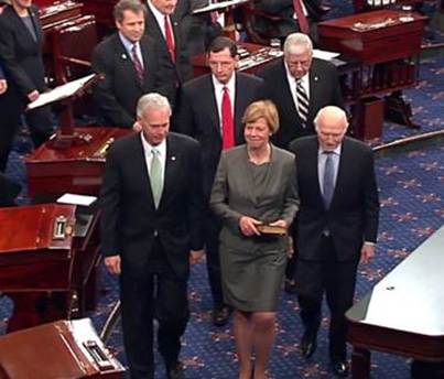 Johnson Joins Baldwin for Swearing In